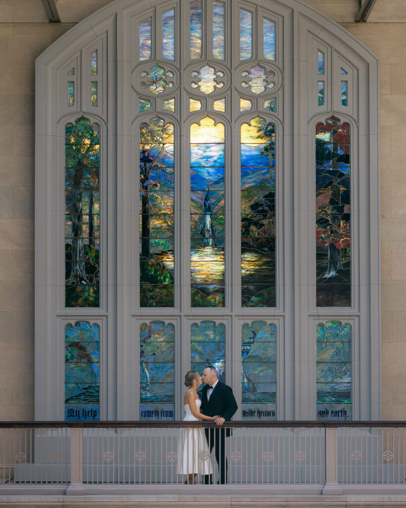 elopement portrait in front of the tiffany stained glass window at the art institute of chicago